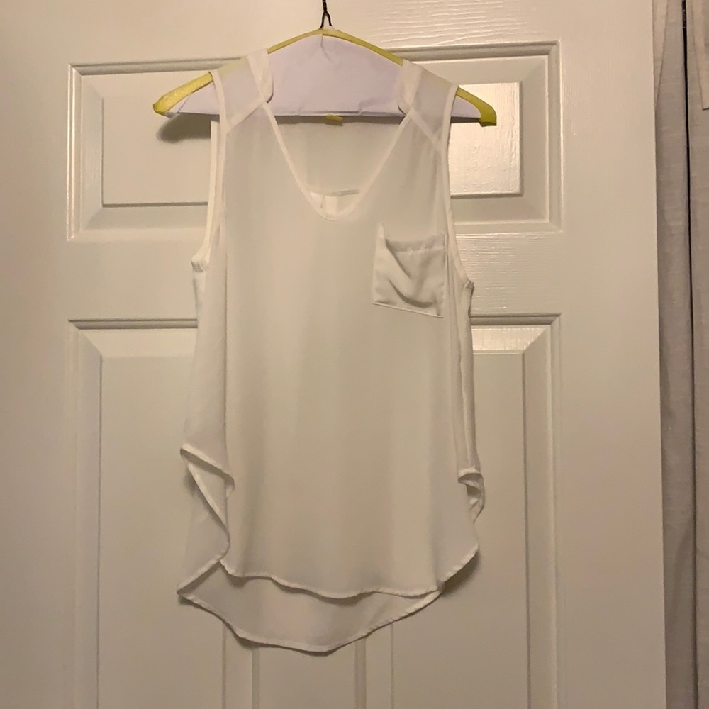 White sleeveless top